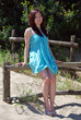 Asian girl with a light blue dress in the dunes 1