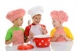 Three little chefs  preparing  soup
