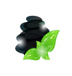 Cairn stones with eco green leaves isolated on white, spa backgr Cairn stones with eco green leaves isolated on white, spa backgr