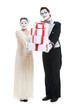 funny mimes with gift boxes over white