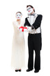 two funny mimes with gift box in studio on white