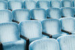 Empty blue chairs in a conference room Empty blue chairs in a conference room