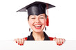 Portrait of a graduating woman holding a display for text Portrait of a graduating woman holding a display for text