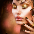 Gold Makeup. Fashion Girl Portrait