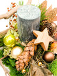 Natural christmas arrangement with candle on white Natural christmas arrangement with candle on white
