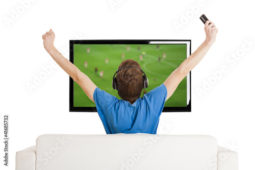 Photo: Watching football on TV Watching football on TV