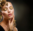 Golden Makeup. Luxury Fashion Girl Portrait
