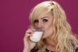 Woman drinking milk.