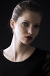 fashion low key portrait, she is turned of three quarters