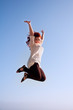 fun happy girl, and a jump of freedom in the sky