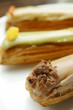 Chocolate eclairs on plate