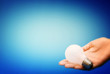 Background with lit lightbulb