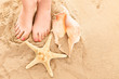 Feets and beach sand