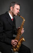 saxophonist on dark