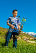 Photo: A young boy shooting archery A young boy shooting archery