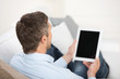 mann schaut auf tablet-pc mann schaut auf tablet-pc