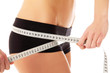 Photo: woman measure her waist belly by metre-stick woman measure her waist belly by metre-stick