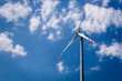Wind turbine on blue sky background Wind turbine on blue sky background