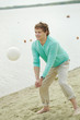Playing volleyball