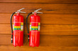 extinguisher on wooden wall