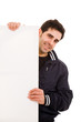 Portrait of a happy handsome young man holding blank white card Portrait of a happy handsome young man holding blank white card