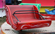 The Empty Seats of a Fast Spinning Fun Fair Ride.