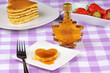 Mini heart-shaped pancake with syrup Mini heart-shaped pancake with syrup