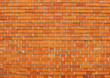 bright orange section of a brick wall bright orange section of a brick wall