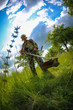 man with lawn trimmer