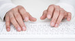 Close up of human hands typing at the keyboard Close up of human hands typing at the keyboard
