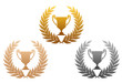 Golden, silver and bronze laurel wreaths with trophy
