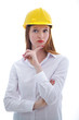 Photo: Long haired happy girl with yellow helmet thinking Long haired happy girl with yellow helmet thinking