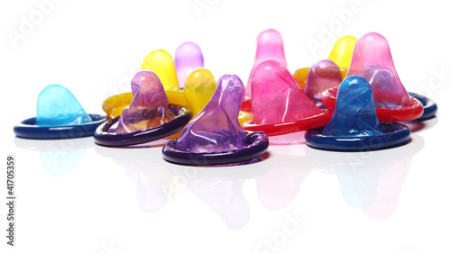 Photo: Close up of colorful condoms Close up of colorful condoms