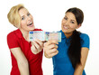 Two girls are happy to get a driver licence