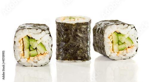 Photo: Sushi Roll (Kappa maki roll) on a white background Sushi Roll (Kappa maki roll) on a white background
