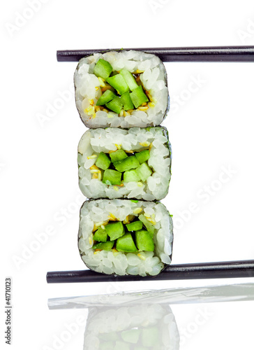 Photo: Sushi Roll (Kappa maki roll) on a white background Sushi Roll (Kappa maki roll) on a white background