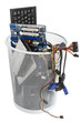 electronic scrap in trash can