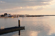 Sunset on harbour and calm sea