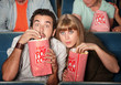 Photo: Captivated Couple in Theater Captivated Couple in Theater
