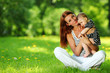 Photo: Mother and daughter on the green grass Mother and daughter on the green grass