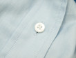 A button on a finest-quality shirt