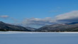 Time lapse of winter snow field, mountain and clouds Time lapse of winter snow field, mountain and clouds