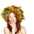 woman with flower wreath on head holding apple woman with flower wreath on head holding apple