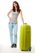 Photo: Happy girl standing with big green bag Happy girl standing with big green bag