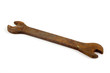 Rusty spanner over white