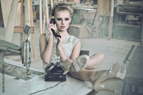 Photo: Sensual woman with a phone Sensual woman with a phone