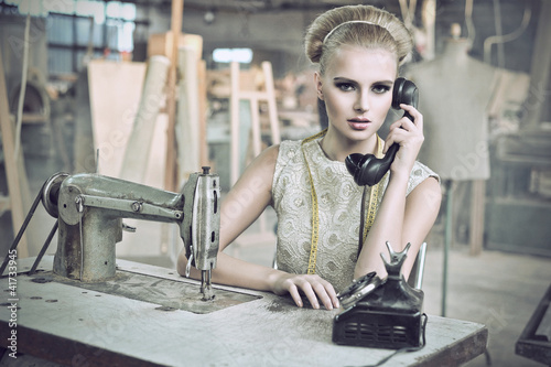 Photo: Beauty woman with a phone Beauty woman with a phone