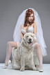 Red beautiful luxury woman in underwear with dog