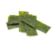 Pieces of seasoned dried seaweed isolated on white