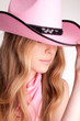 Portrait of a beautiful woman wearing pink cowboy's hat